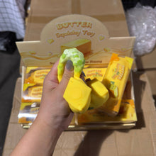 Load image into Gallery viewer, Crackling Crunchy Yellow Butter Squishy 4oz