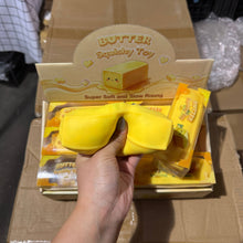 Load image into Gallery viewer, Crackling Crunchy Yellow Butter Squishy 4oz